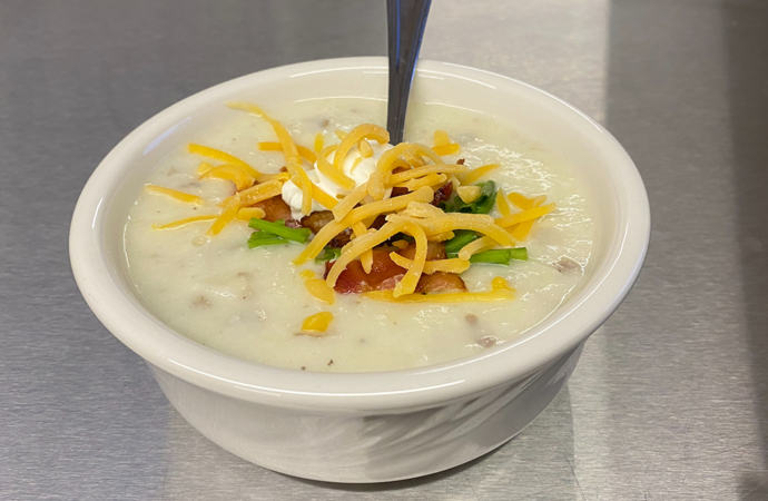 Food demo teaches students how to cook for a crowd