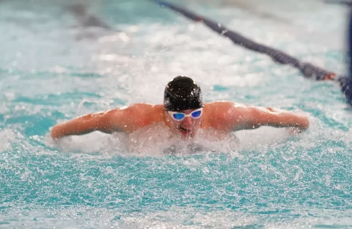 Etown swim dominates in home opener tri-meet