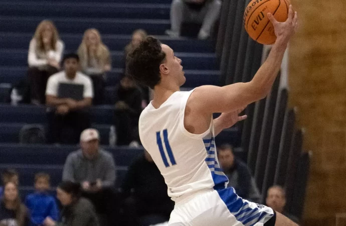 Strong second half leads men’s basketball to season-opening win