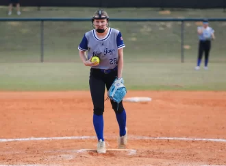 Softball splits with second-place Catholic as Sydney Harper throws complete game shutout