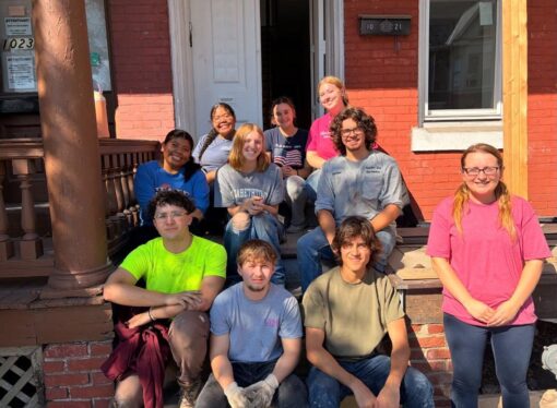Students spend fall break restoring homes with Habitat for Humanity.